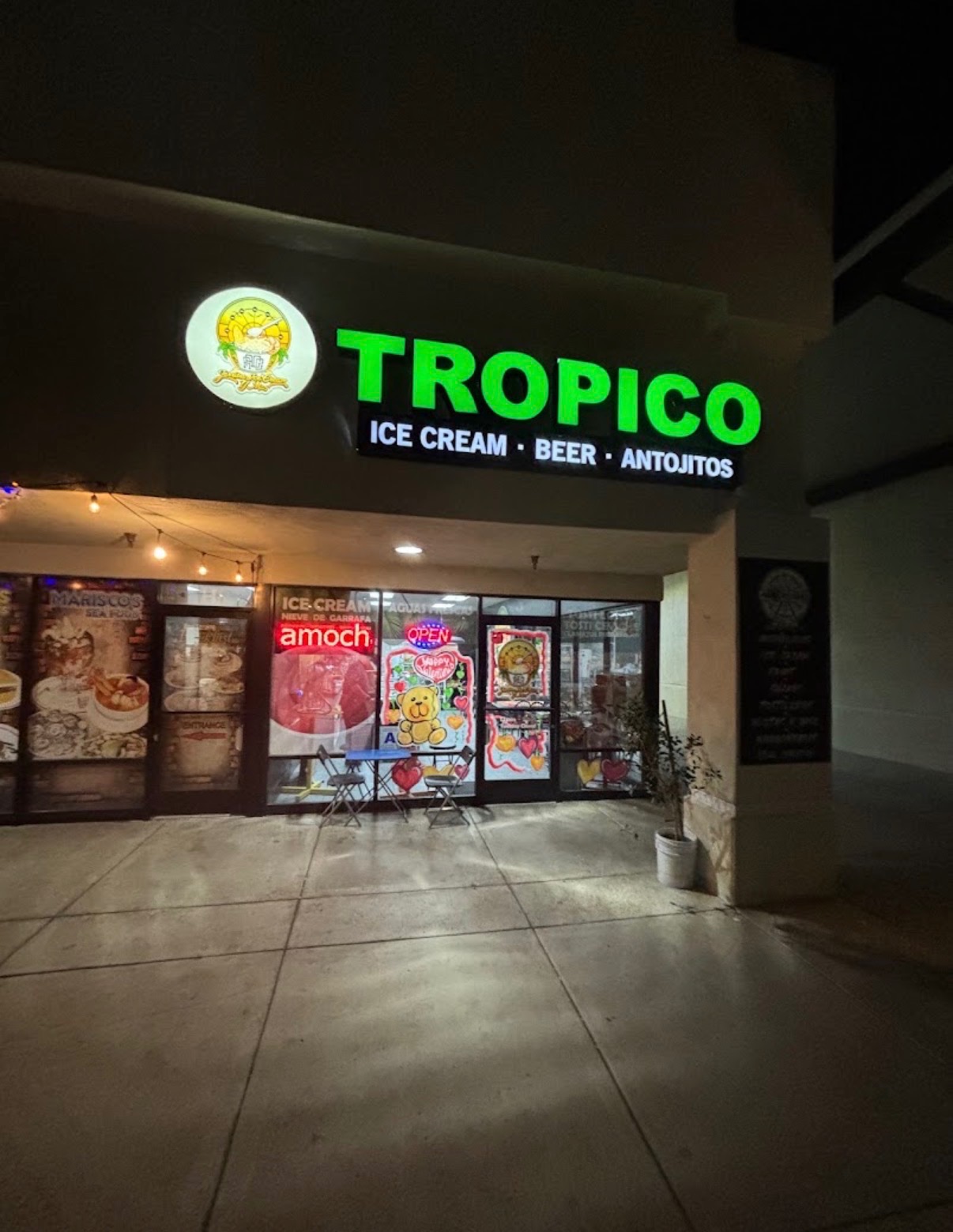Jarritos Tropico Ice Cream storefront at night